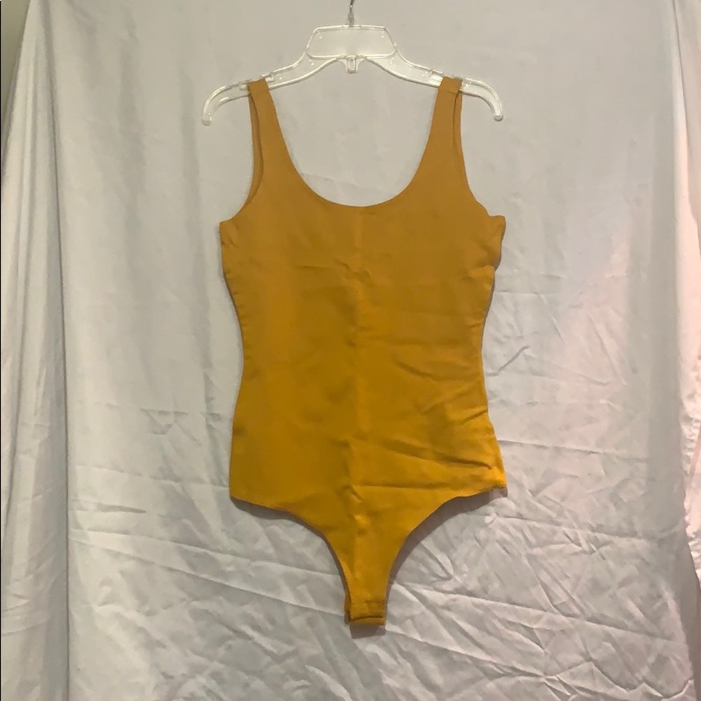 Mustard colored one piece tank top